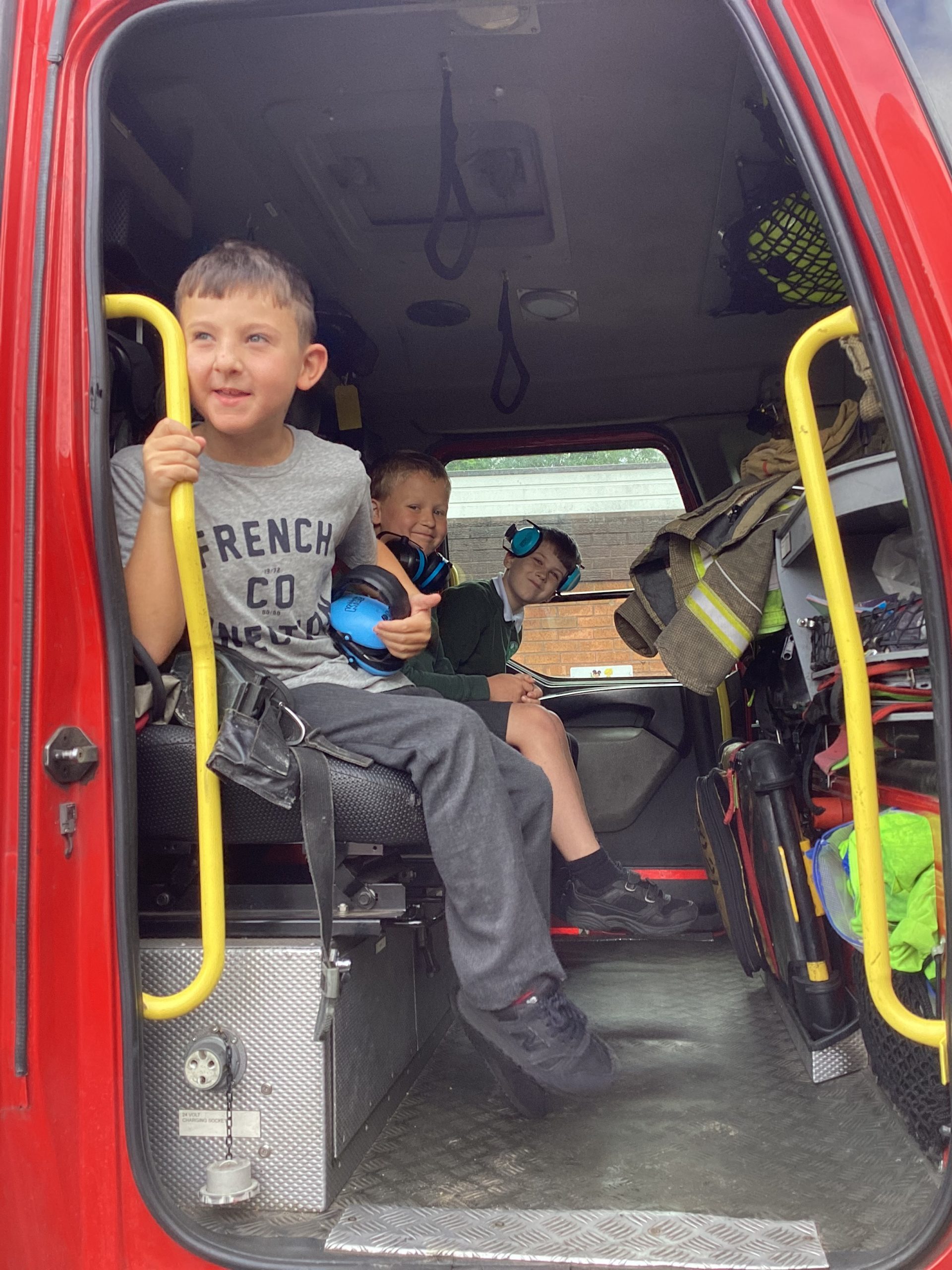 Pupils from The Rowan School in Dudley enjoy a visit from the local fire brigade, and they got to have a look around the truck!