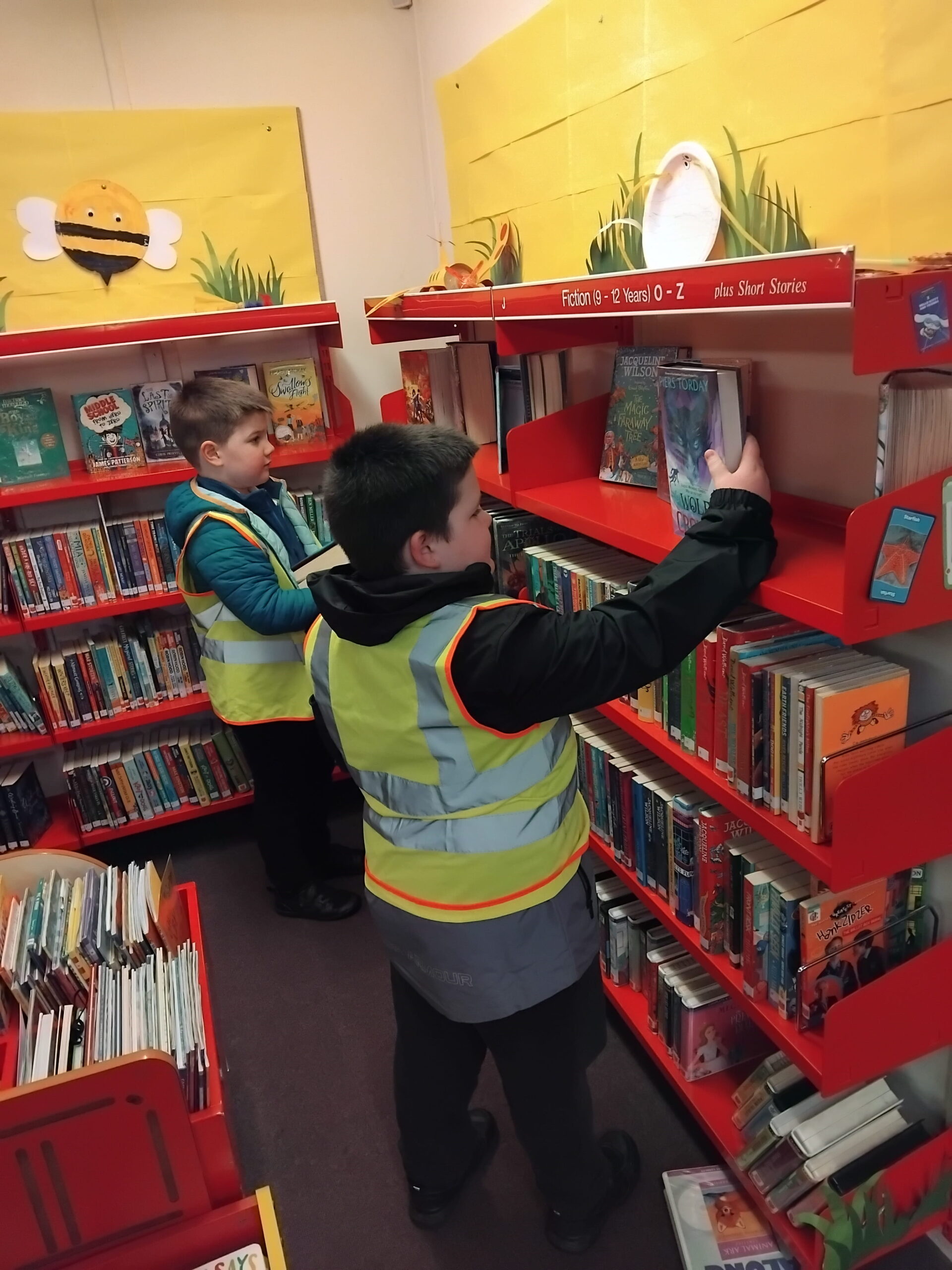Learners from Rowan School selecting their favourite stories at the local library.