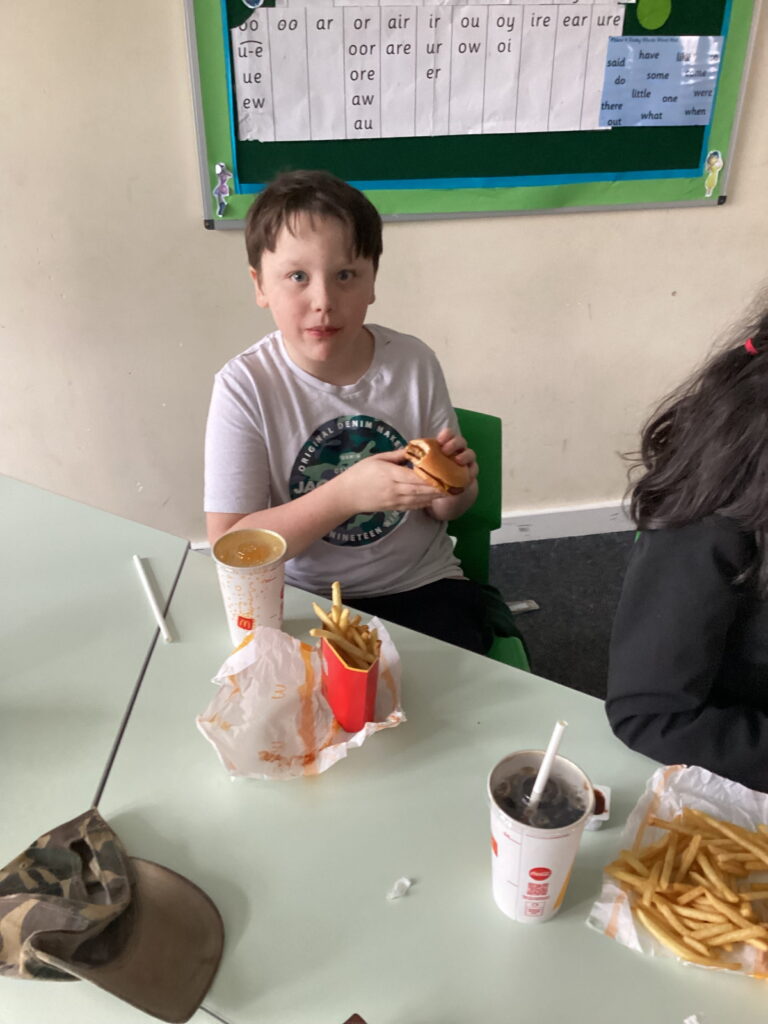 Learners at Rowan School sharing their McDonald’s treat during Good to be Green celebration.