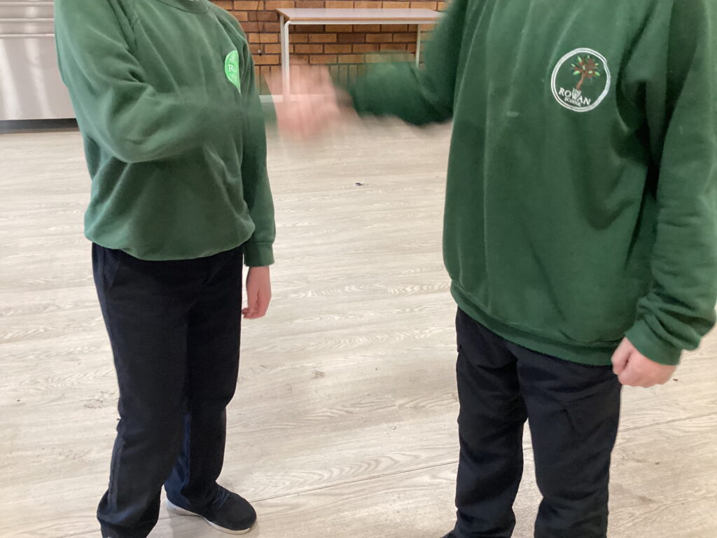 Rowan School Willow Class demonstrating teamwork and sportsmanship in competitive dodgeball games.