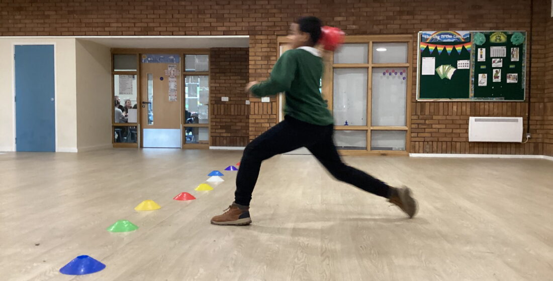 Willow Class learners practising dodgeball skills during PE at Rowan School.