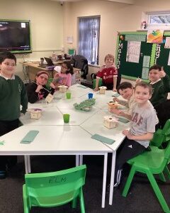 Rowan School learners creating birdhouses and participating in RSPB Birdwatch Week.