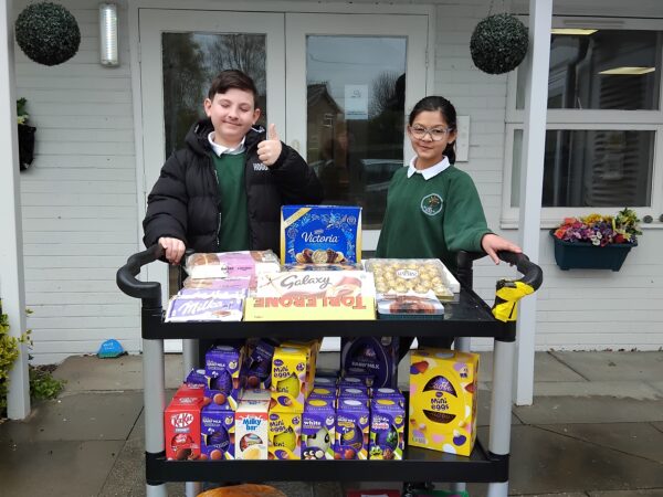 Learners engaging with others and sharing thoughtful donations during Easter