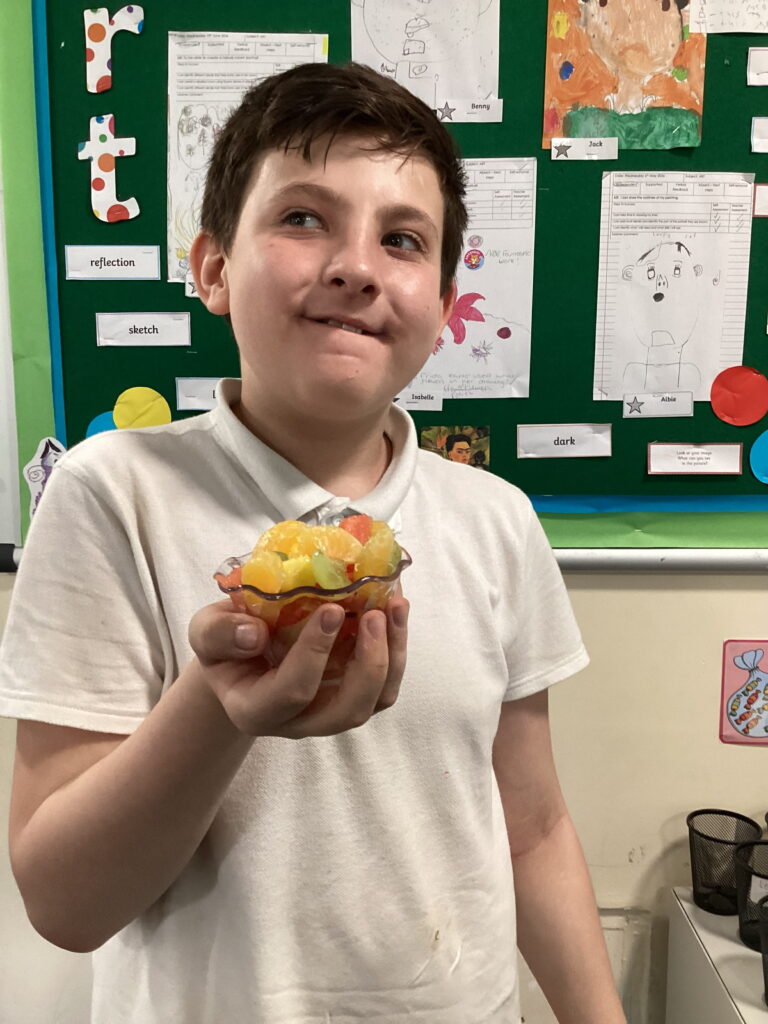 Hands-on learning at The Rowan School helps Elm Class build independence and confidence while creating healthy fruit salads during their Junior Duke challenge.